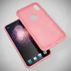 A pink phone case is shown next to a smartphone with a fireworks wallpaper. Produktbild-Vorschau