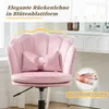 A pink velvet office chair with a decorative backrest and a bow-shaped lumbar pillow, placed in a room with a vanity table in the background. Produktbild-Vorschau