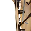 A close-up view of the mechanical components of a wooden attic ladder. Podgląd zdjęcia produktu