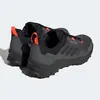 A pair of Adidas Terrex AX4 hiking shoes in gray, black, and orange. Anteprima dell’immagine prodotto