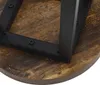 A close-up view of the underside of a round wooden table with a black metal frame attached. Náhľad obrázku produktu