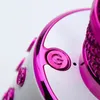 A close-up shot of a pink and white karaoke microphone. Produktbild-Vorschau