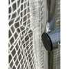 A close-up view of a greenhouse cover attached to a metal frame. Produktbild-Vorschau