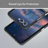 Close-up of two phone cases with screens displaying a landscape. Produktbild-Vorschau