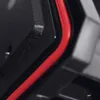 A close-up view of a black tool case with a red trim. Náhled obrázku produktu