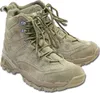 A pair of tan tactical boots. Produktbild-Vorschau