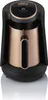 A close-up of a black and gold Turkish coffee maker. Produktbild-Vorschau