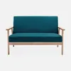 A teal two-seater sofa with light wood legs and arms, presented against a plain white background. Anteprima dell’immagine prodotto