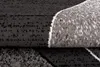 A close-up view of a rug, showing its texture and pattern. Anteprima dell’immagine prodotto
