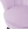 A close-up view of a purple velvet chair, focusing on the seat and the shell-shaped backrest. Produktbild-Vorschau