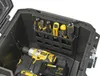 An open toolbox with tools and a drill inside. Anteprima dell’immagine prodotto
