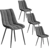 Four dark gray upholstered dining chairs with black metal legs are arranged on a white background. Produktbild-Vorschau