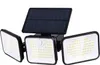 A solar-powered LED light with three adjustable heads and a solar panel. Anteprima dell’immagine prodotto