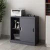 A dark gray metal filing cabinet with sliding doors, a printer on top, and decorative items and a storage bin inside. Podgląd zdjęcia produktu