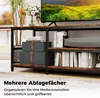 A TV stand with shelves filled with books and storage boxes, with a TV on top. Náhľad obrázku produktu