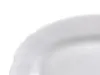 A close-up view of a white plate with a scalloped edge. Voir les images du produit