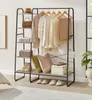 A clothing rack with clothes, accessories, and shoes displayed on shelves in a room. Produktbild-Vorschau