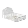 A white wooden children's bed with a house-shaped headboard and safety rails. Produktbild-Vorschau