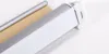 A close-up, angled view of a white and silver roller blind mechanism on a white background. Produktbild-Vorschau