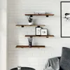 Shelves mounted on a white brick wall with decorative items. Produktbild-Vorschau