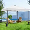 A white canopy tent is set up on a grassy lawn next to a swimming pool, with two wooden chairs and a small table in front of it. Produktbild-Vorschau