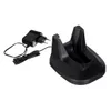 A black charging stand and power adapter for a cordless stick vacuum cleaner are shown against a white background. Anteprima dell’immagine prodotto