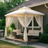 A patio gazebo with sheer curtains and outdoor furniture set up on a wooden deck. Produktbild-Vorschau