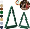Two green wooden Christmas trees are displayed against a white background, with a smaller inset image showing natural wood trees and Christmas decorations. Anteprima dell’immagine prodotto