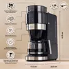 A black and silver coffee machine with various features highlighted by circular icons and text labels. Produktbild-Vorschau