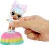 A hand is holding a small doll on a colorful base. Produktbild-Vorschau