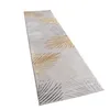 A long, narrow rug with a leaf pattern is shown against a white background. Anteprima dell’immagine prodotto