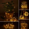 A collage of images showing warm white LED string lights used in various decorative settings. Produktbild-Vorschau