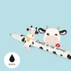 A cartoon cow-themed pen with text on it, set against a light blue background. Produktbild-Vorschau