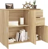 A wooden sideboard with open doors and drawers, displaying books and decorative items on shelves. Náhľad obrázku produktu