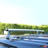 Close-up of a silver roof rack on a black car, with a green hedge and blue sky in the background. Náhľad obrázku produktu