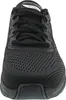 A close-up, front-facing view of a black Skechers Arch Fit shoe. Produktbild-Vorschau