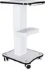 A white salon trolley with a black trim and wheels, shown from a front-side angle against a white background. Náhled obrázku produktu