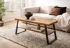 A modern living room scene with a couch, coffee table, and rug. Voir les images du produit