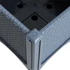 Close-up view of the corner of a grey raised garden bed with a rattan-like texture. Produktbild-Vorschau