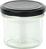 A clear glass jar with a black lid, isolated on a white background. Náhled obrázku produktu
