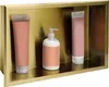 A bathroom shelf with three cosmetic bottles. Produktbild-Vorschau
