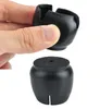 A hand is holding a black chair leg cap, with another cap shown below it. Anteprima dell’immagine prodotto