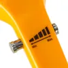 A close-up view of a dial with volume indicator markings on an orange device. Náhled obrázku produktu