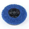 A round blue cleaning pad with a black central mechanism is shown against a white background. Podgląd zdjęcia produktu