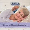 An older couple sleeping in a bed, with a product logo and text overlay. Voir les images du produit