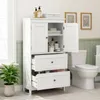 A white bathroom cabinet with open doors and drawers next to a toilet. Produktbild-Vorschau