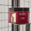 A jar of Revlon Uniq One hair mask is displayed on a shelf. Podgląd zdjęcia produktu
