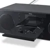 A close-up shot of a black HAMA radio with the CD tray open. Produktbild-Vorschau