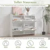 A white shoe cabinet with multiple open compartments, displaying shoes and decorative items. The image includes text overlays and icons. Produktbild-Vorschau