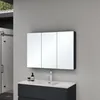 A modern bathroom vanity with a medicine cabinet above. Anteprima dell’immagine prodotto
